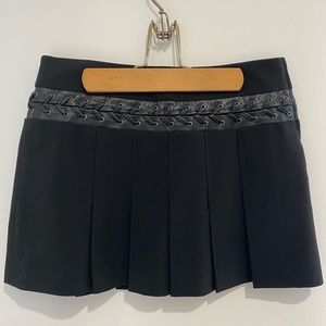 BCBG pleated mini skirt with leather lace